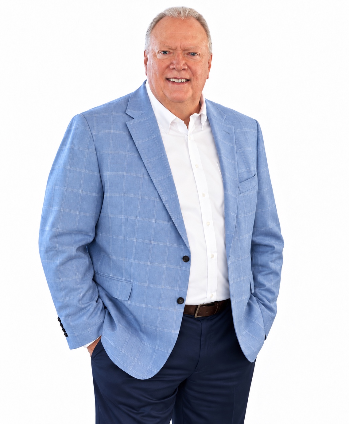 Randy Stroman smiling in a light blue blazer